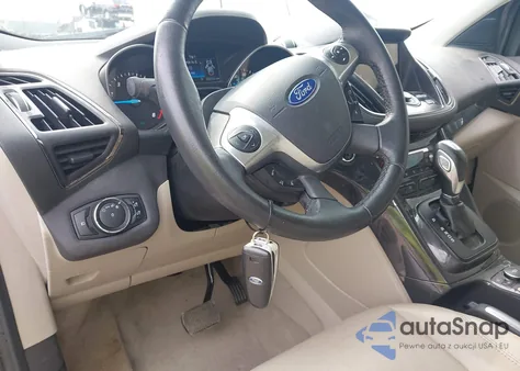 2014 Ford Escape Titanium z USA, uszkodzony, nr VIN 1FMCU0J97EUD78780